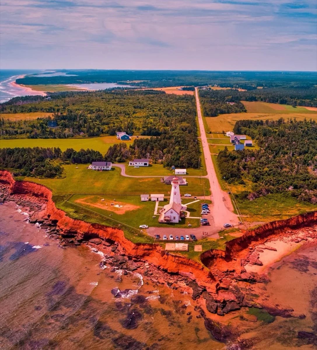 Prince Edward Island red cliffs and lighthouse — Shaheen Taxi scenic PEI transportation